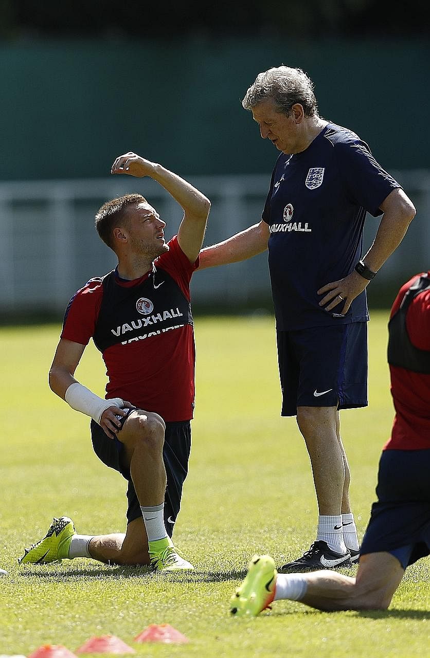 England manager Roy Hodgson instructing Jamie Vardy. The Three Lions hope to display a sharpness in front of goal that has been lacking, when they take on Iceland in the last 16.