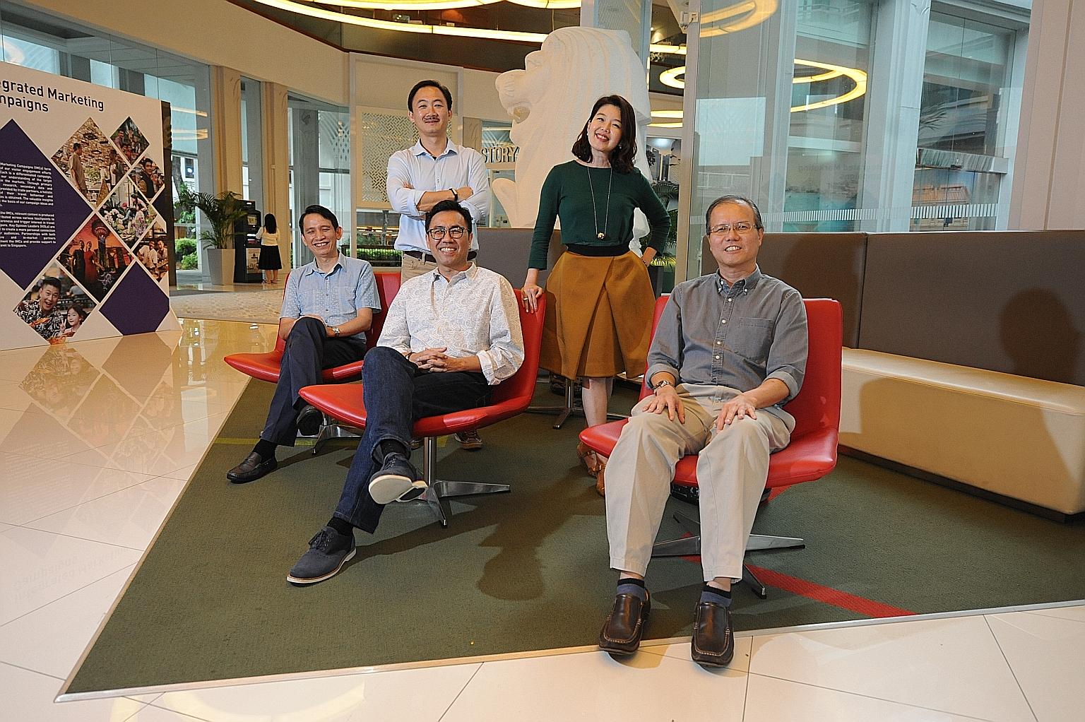 The team behind Wegogo: (seated, from left) Mr Tan, Mr Wong and Mr Mak; and (standing, from left) Mr Yue and Ms Ho-Phang. The start-up is an online platform for small travel service providers here and worldwide to sell directly to Chinese travellers.