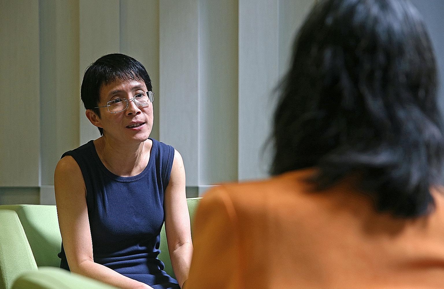 Dr Lee with Madam Goh, who was one of 14 patients in the NCIS trial. In the trial, doctors use the body's natural killer cells to stop the progression of late-stage breast cancer.