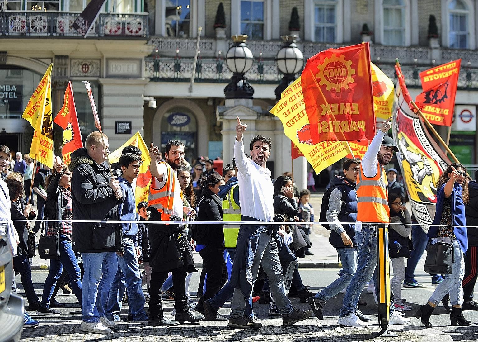 Protesters holding a May Day march in London. Left unchecked, globalisation has been shown to widen the income gap and negatively affect the standard of living of the average citizen. Wealth is largely concentrated in the pockets of the moneyed elite