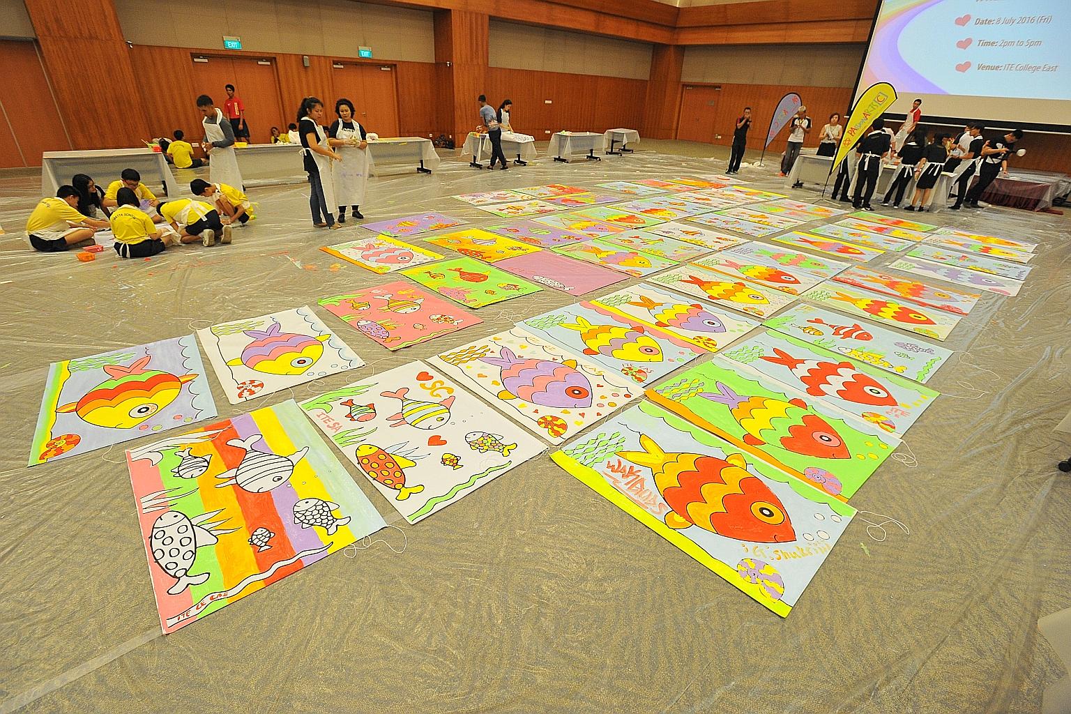 More than 80 Institute of Technical Education (ITE) and Metta School students and staff painted flags in preparation for National Day yesterday as part of the PAssionArts Festival. Organised by ITE and Tampines Changkat Community Club, the completed 