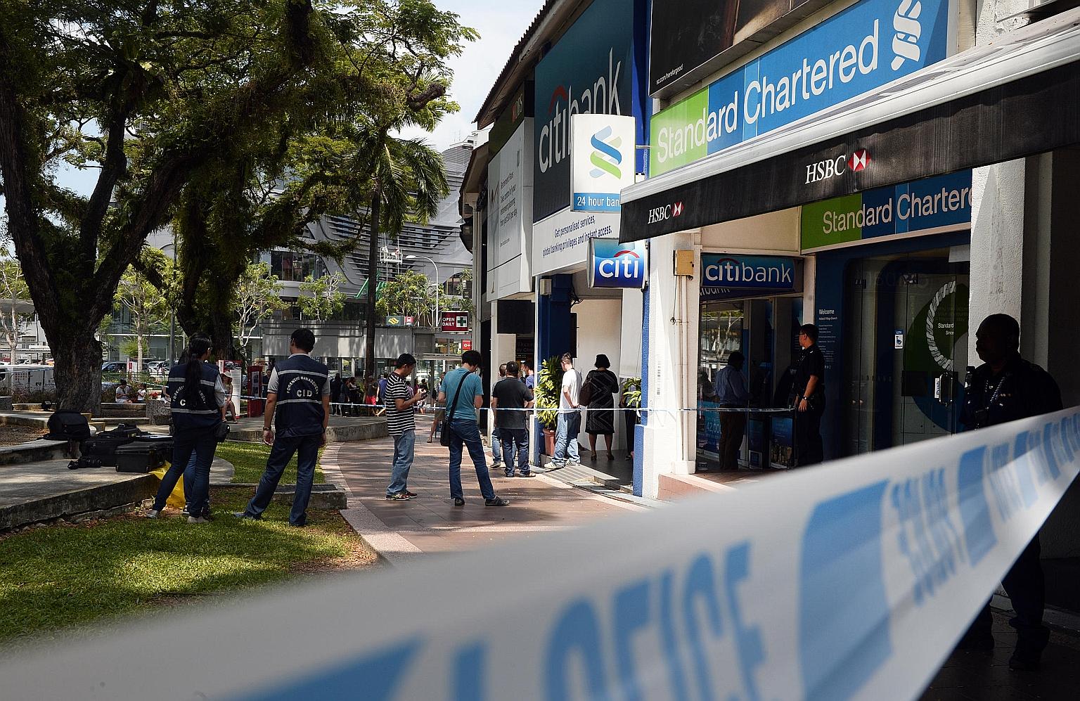 The suspect, a Canadian, fled Singapore last Thursday with $30,000 in cash after robbing StanChart's branch in Holland Village.