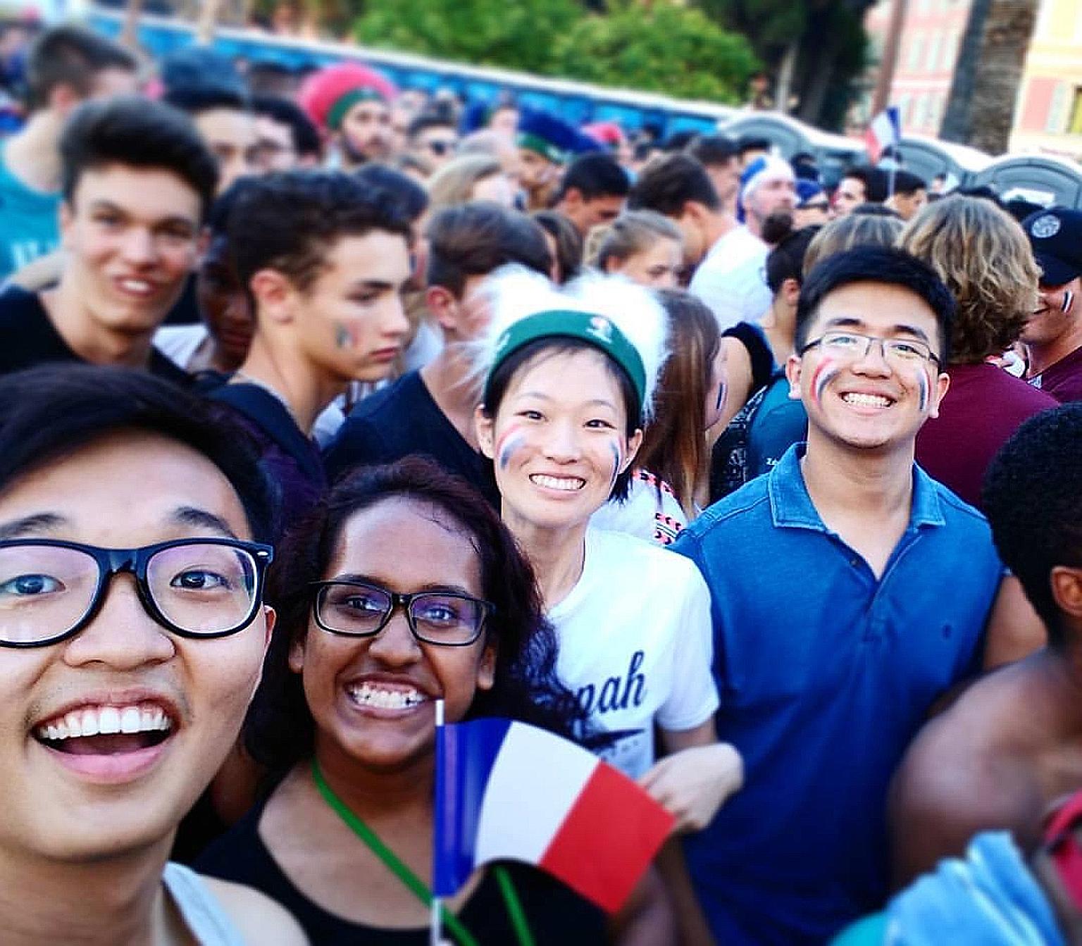 Mr Huang (far left), at a screening of a Euro 2016 football match in France with his friends the week before the Bastille Day attack. He had left the Promenade des Anglais shortly before the truck ploughed into the crowd.