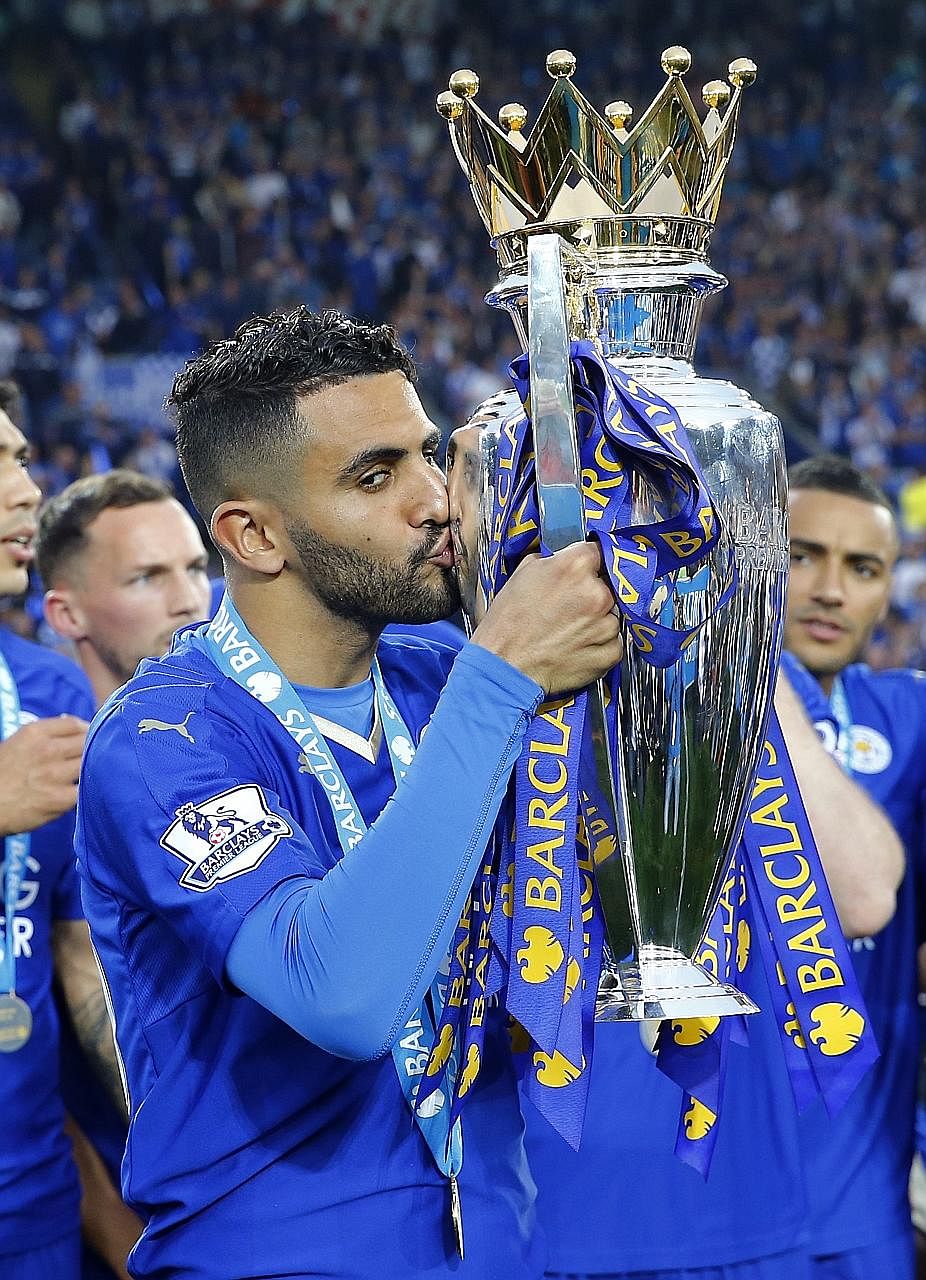Leicester City's Riyad Mahrez, seen kissing the Premier League trophy, has told his representatives to find him a new club.