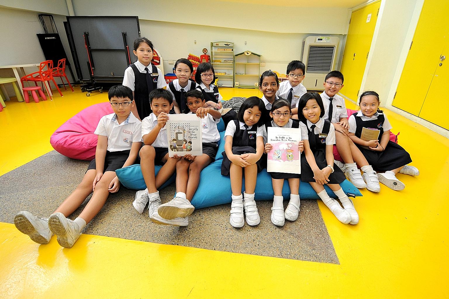 The Primary 4 pupils from Teck Whye Primary School who co-authored the two books: (front row, from left) Callum Mok, Matriano Isaiah Riley Del Rosario, Kailasom Aditya Suresh, Zhang Hui Xin, Marzan Mariel Elisha Cornelio and Teng Kaixin; (back row, f