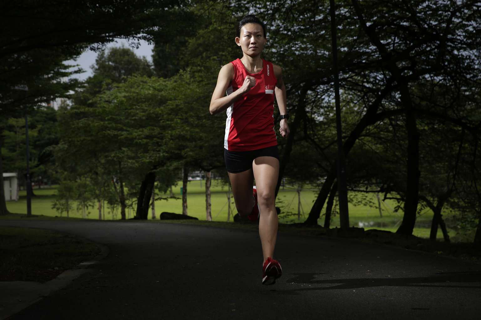 Neo Jie Shi, a marathoner for the Olympic Games, runs in a park near Jurong SAFRA where she trains. She is the first female marathoner since Yvonne Danson at the 1996 Atlanta Games.