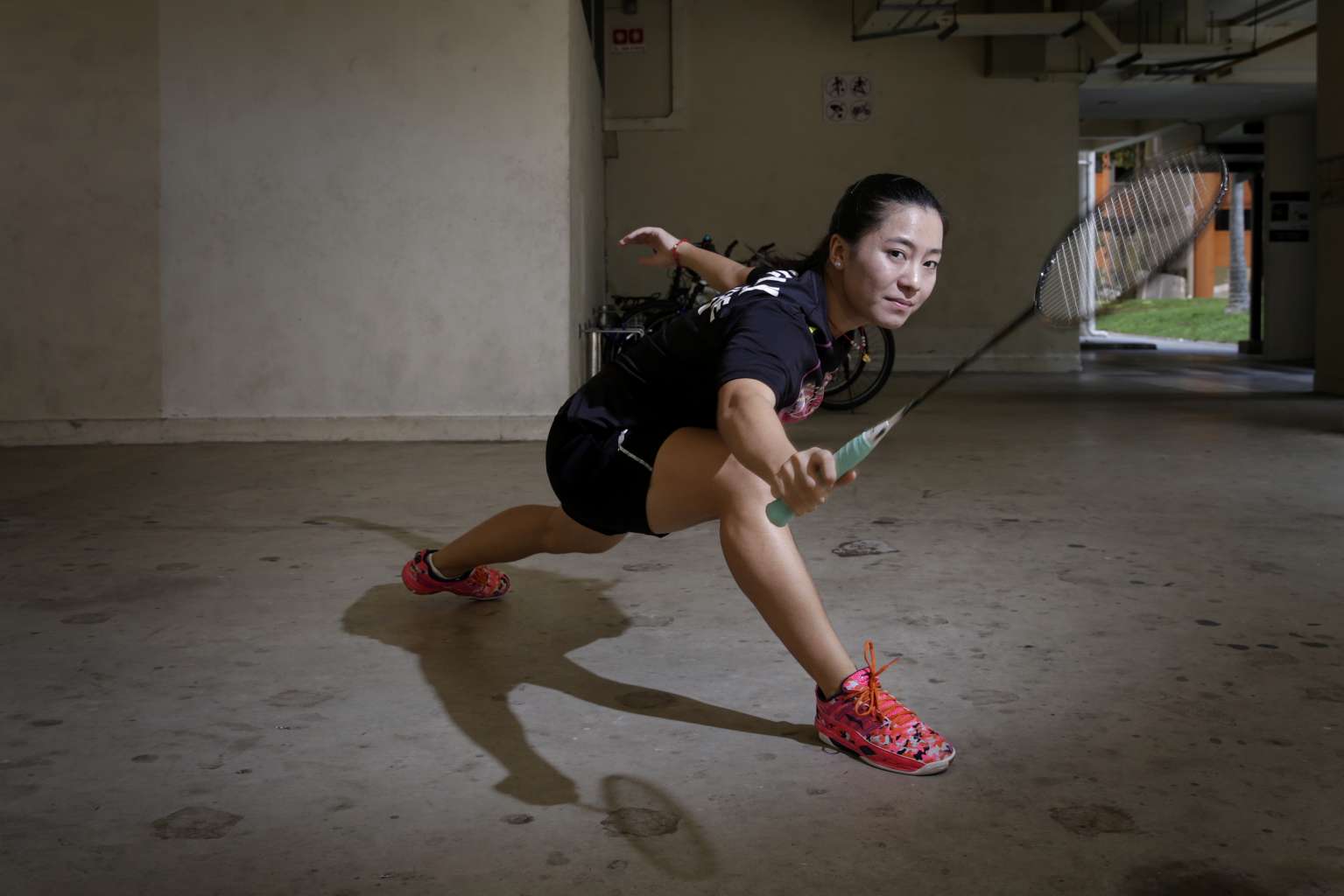 Singapore's shuttler Liang Xiaoyu, who will be making her Olympic debut in Rio, training at the void deck in Marsiling Crescent, where the 20-year-old has been sharpening her badminton techniques since 2007.