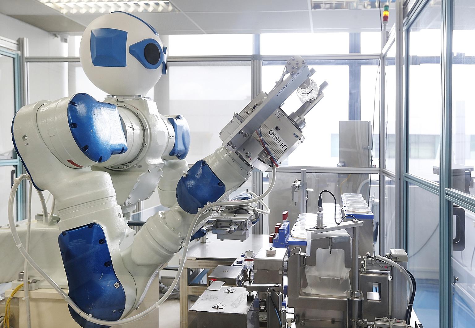 A robot designed for an industrial microbiological testing laboratory that provides tests for products, including general food products and traditional Chinese medicine.