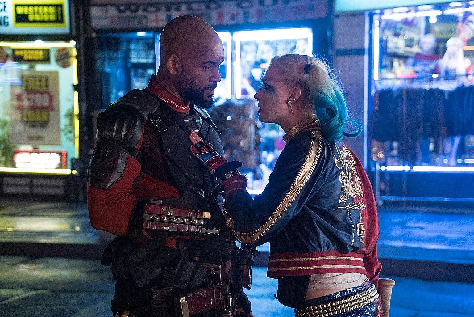 Will Smith as Deadshot and Margot Robbie as Harley Quinn (both above) in Suicide Squad, and Tatsuya Fujiwara (left) as an aspiring manga creator in Erased.