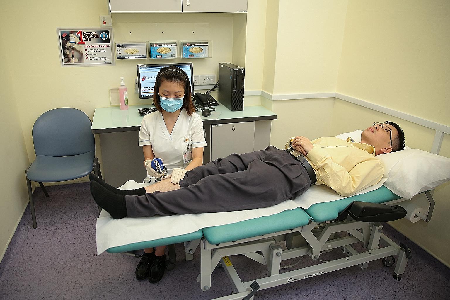 A nurse practises cryotherapy - warts treatment - at the NSC, a task previously done by a doctor. There has been an increase in the number of nurse-run clinics under the NHG, with the number almost doubling since 2012.
