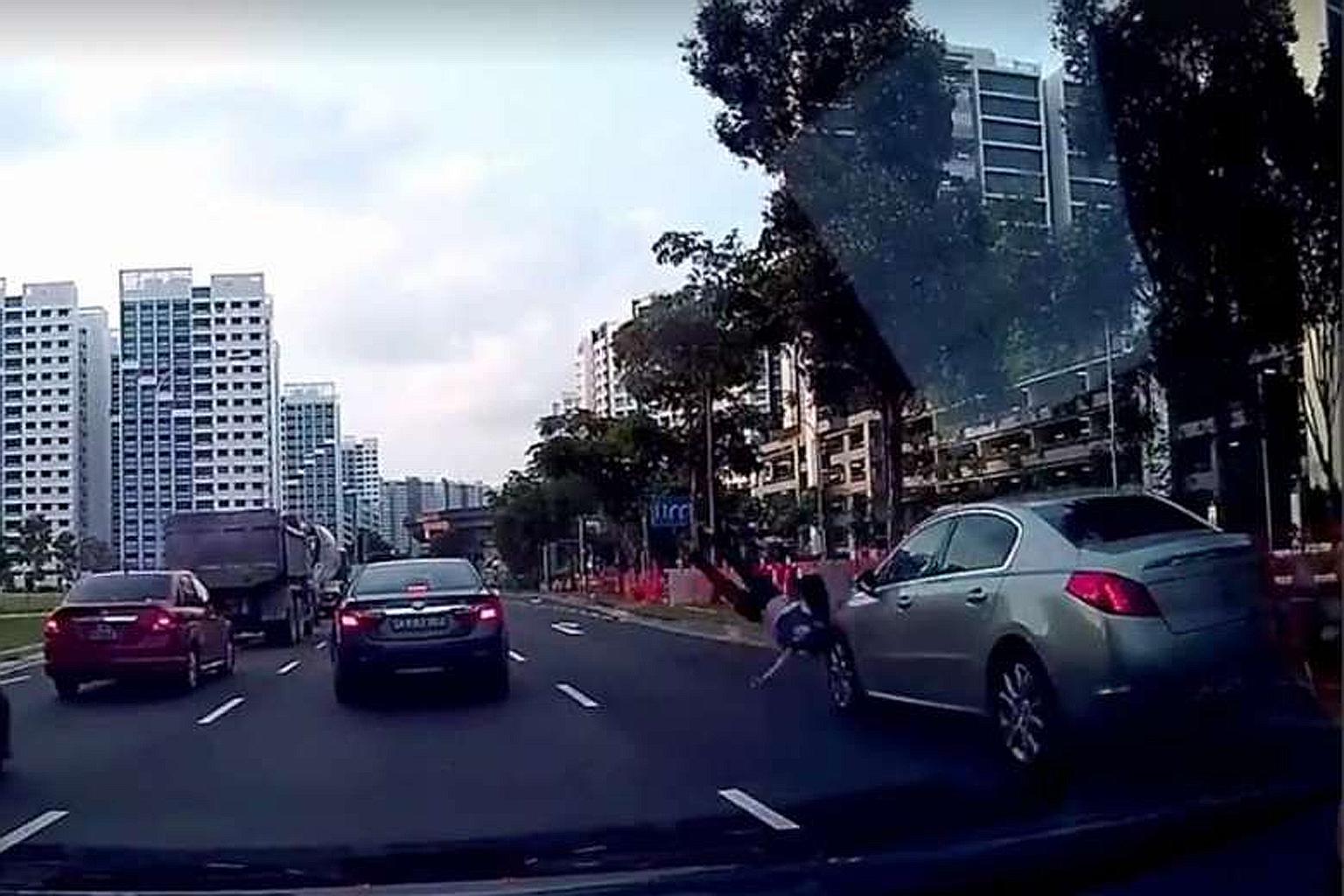 The woman involved in the accident was seen in the video crossing the road without checking for oncoming traffic on her right. The driver of the car and other motorists and pedestrians were seen providing aid to her after the accident.