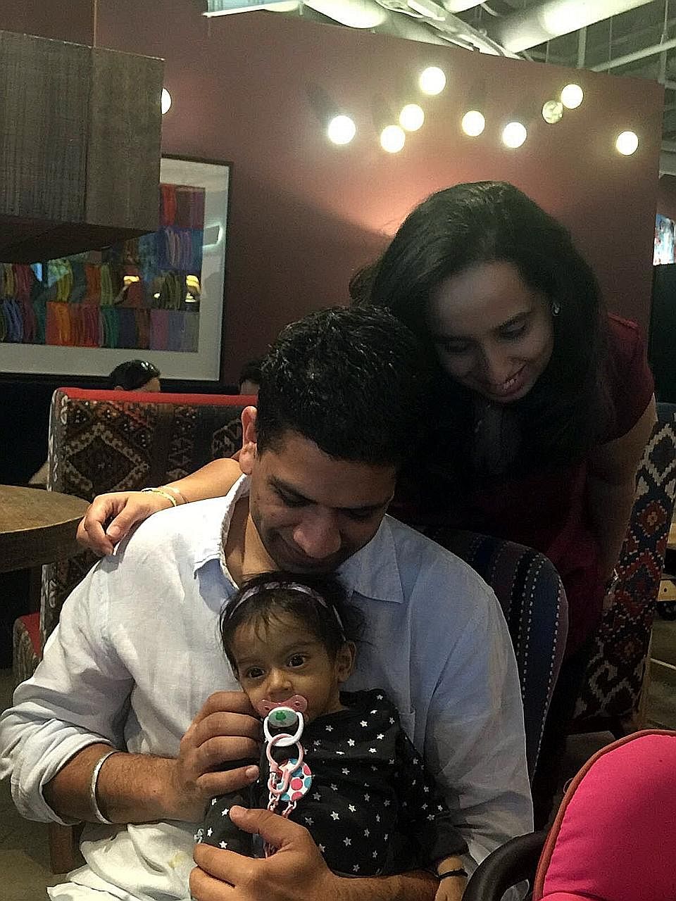 Eight-month-old Zarouhi is fighting for her life at NUH. Her father, Mr Sandeep, donated part of his liver but the transplant failed. Her mother, Ms Wilson, is being assessed for suitability but the couple are looking for a standby donor in case she 