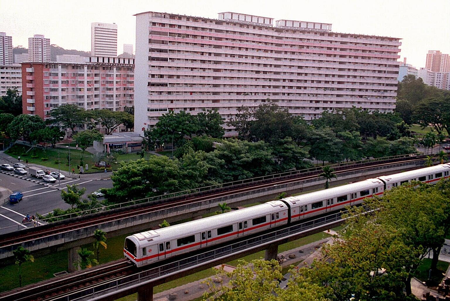 An MRT train plying the East-West line in Redhill in February 1996. LTA said it is "reviewing what is the best treatment for older trains - whether to refurbish them or replace them with new trains, to strike a good balance between cost effectiveness