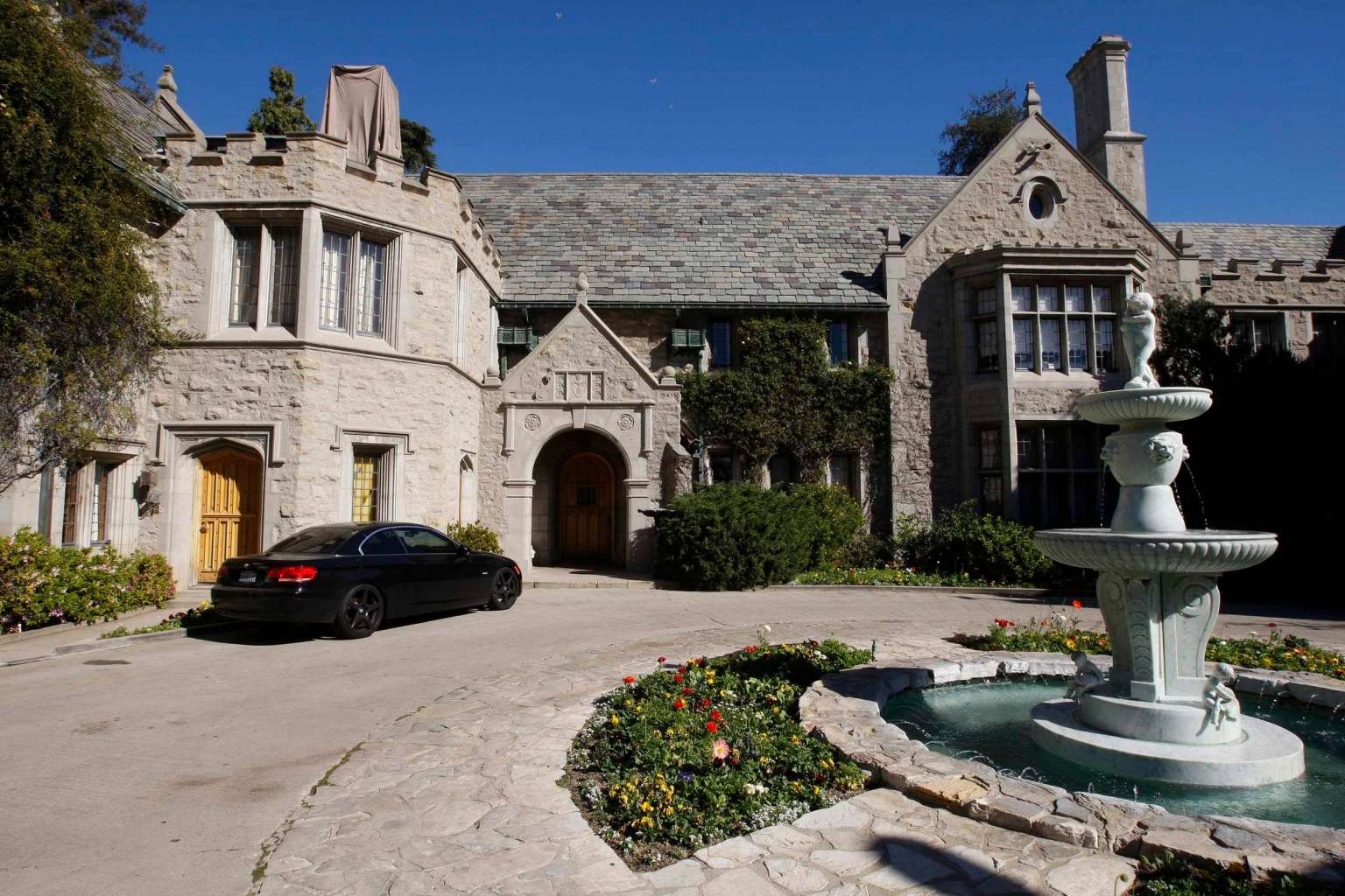 Hugh Hefner's Playboy Mansion in Los Angeles sells for $134 million ...