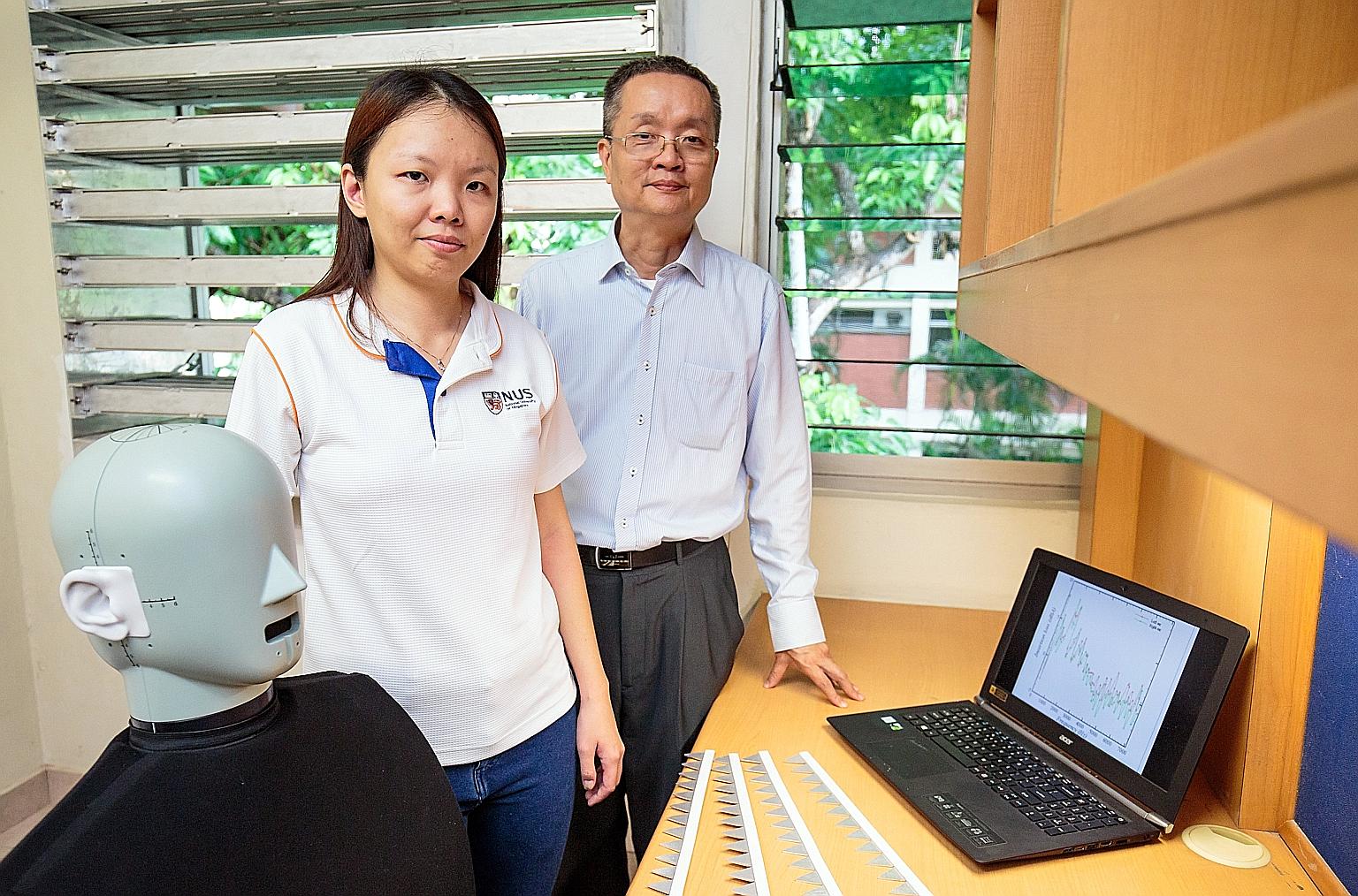 Prof Lee Heow Pueh (far right) and Dr Lee Hsiao Mun and their team worked on the innovative windows. The human dummy helps create a realistic acoustic environment in experiments.