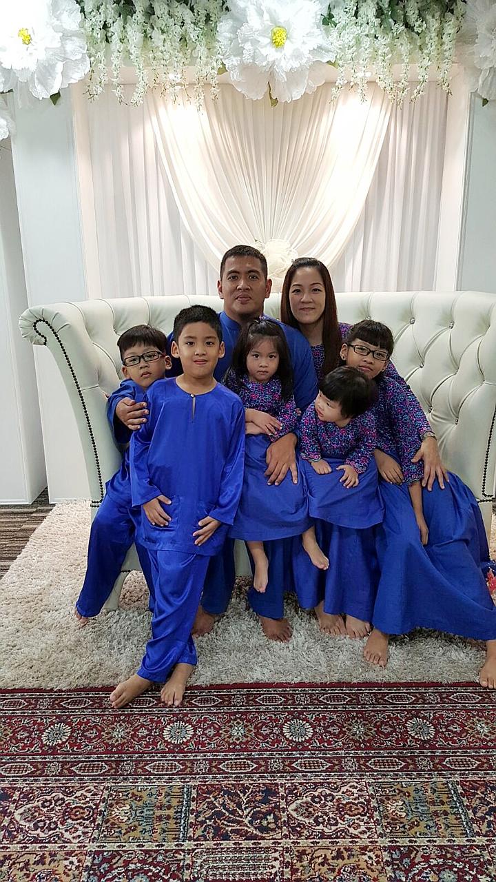 Mr Mirza with his wife Eileen and their children (from left) Ermann, Ezatt, Nur Ezelle, Nur Ezabelle and Nur Ezanne.