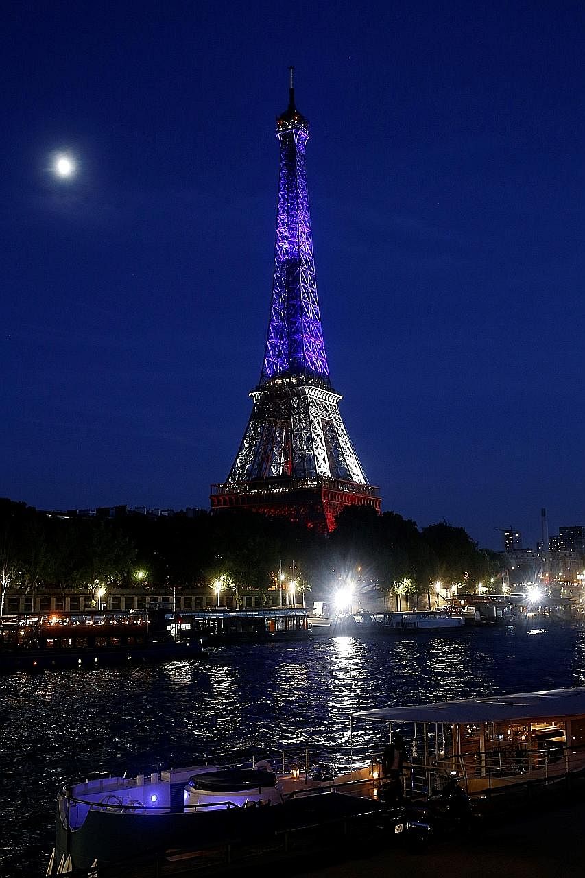Paris' Eiffel Tower a day after the Bastille Day attack in France. The world's most-visited country depends heavily on tourism, which generates over 7 per cent of national gross domestic product.