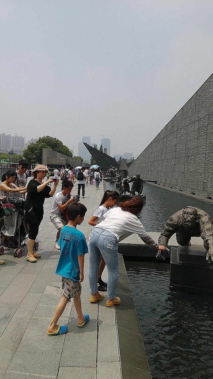 Tourists outside the Nanjing Massacre Memorial Hall in China. Continued denial by right-wing Japanese politicians of the undeniable - that Japanese troops committed atrocities in Korea and China, including the Nanjing Massacre - is an obstacle to bet
