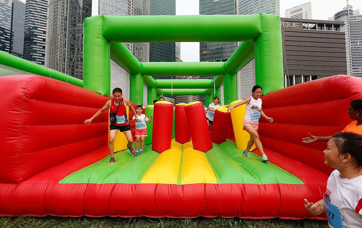 The giant inflatables in the 5km fun run were a hit with participants, and lines of between five to 10 people formed before each obstacle.