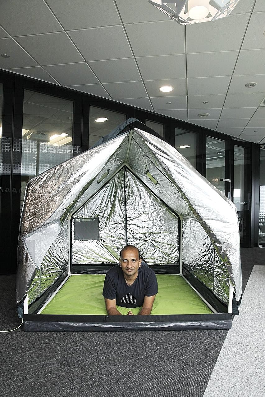 billionBricks co-founder Prasoon Kumar with the weatherHyde tent. In winter, the triple-layer cover provides insulation while reflective material on the inside traps body heat. In summer, the tent cover can be reversed to reflect solar heat so that p