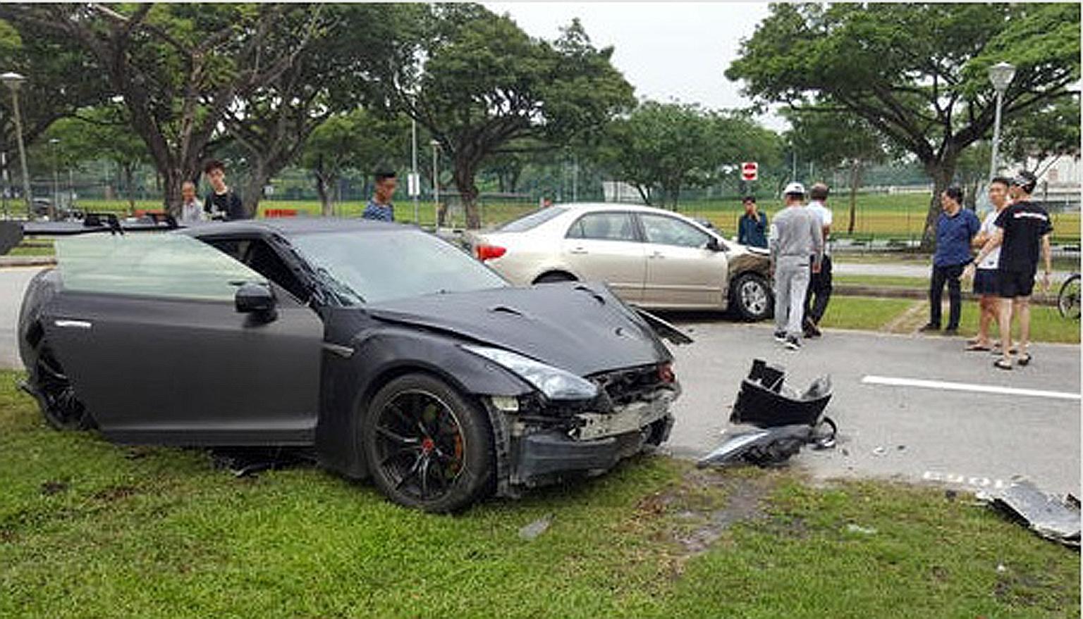 The Nissan GTR (left) driven by the suspect crashed into a Toyota car in a carpark near Stadium Road on Saturday.