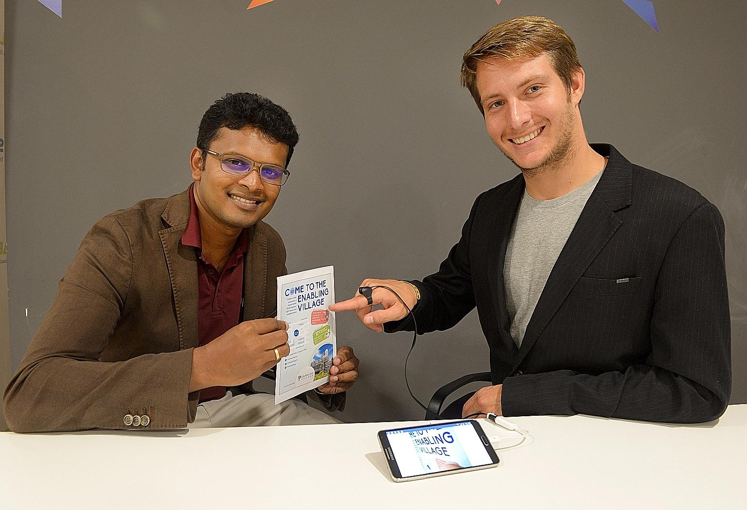 Dr Nanayakkara and Mr Roger Boldu with the FingerReader. It uses a small video camera to help those with visual disabilities identify objects and read text fragments, such as a menu or name card, which are not in Braille.