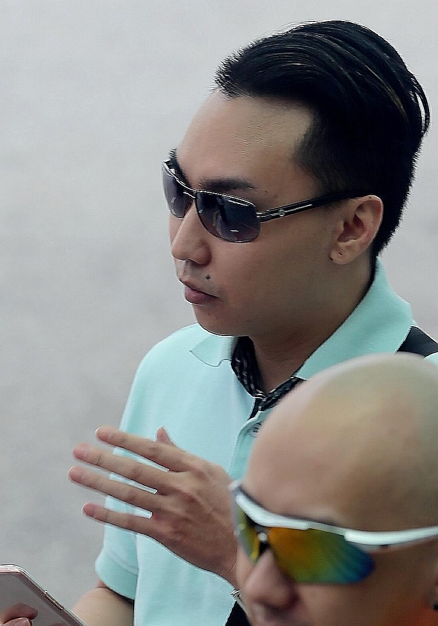 Tan pushed the baby off the bed after the infant had vomited on it. His girlfriend was away at work at the time.