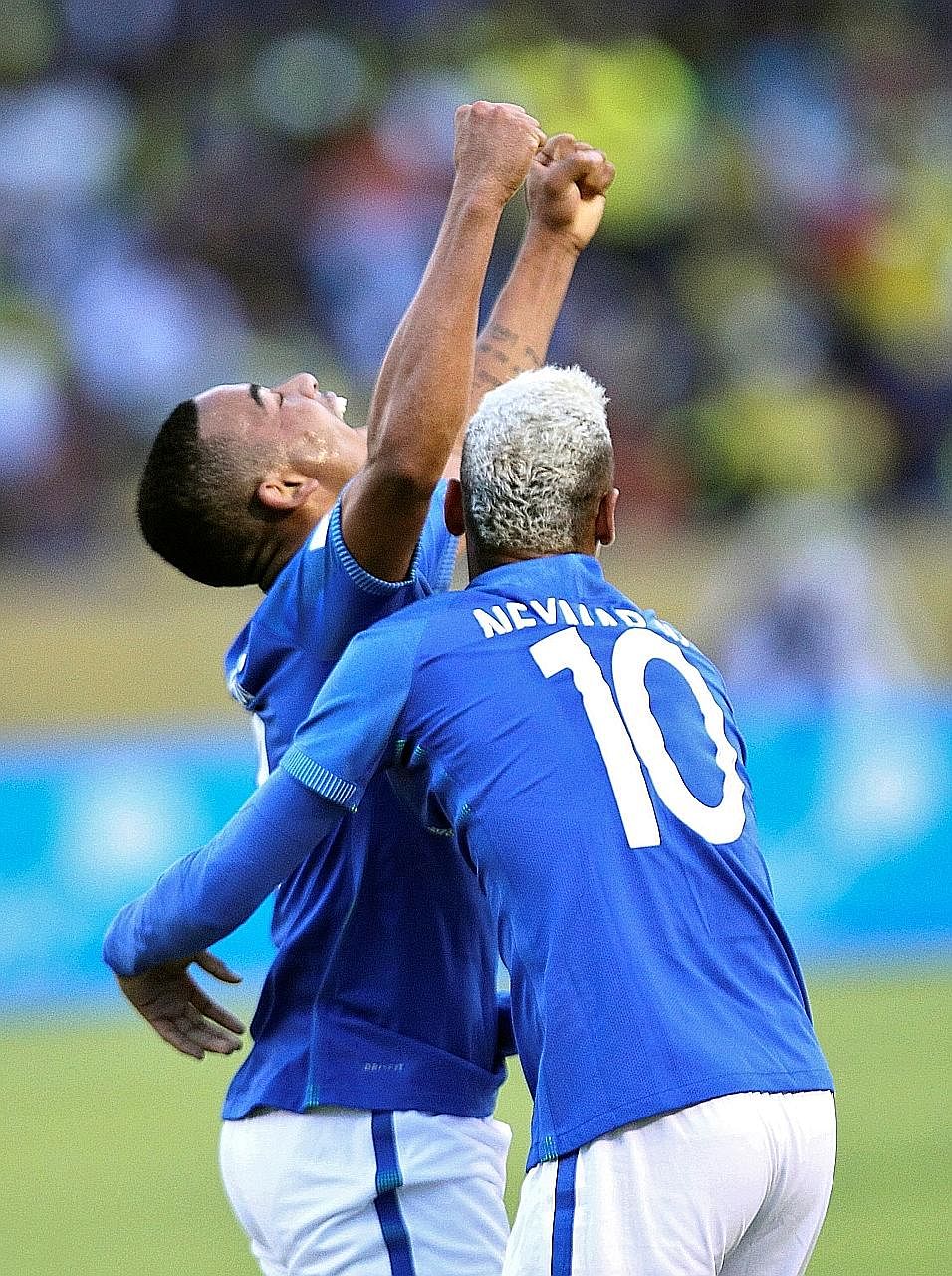 Forward Gabriel Jesus (left) celebrates with Neymar after scoring his first senior goal for Brazil. He scored again in stoppage time.