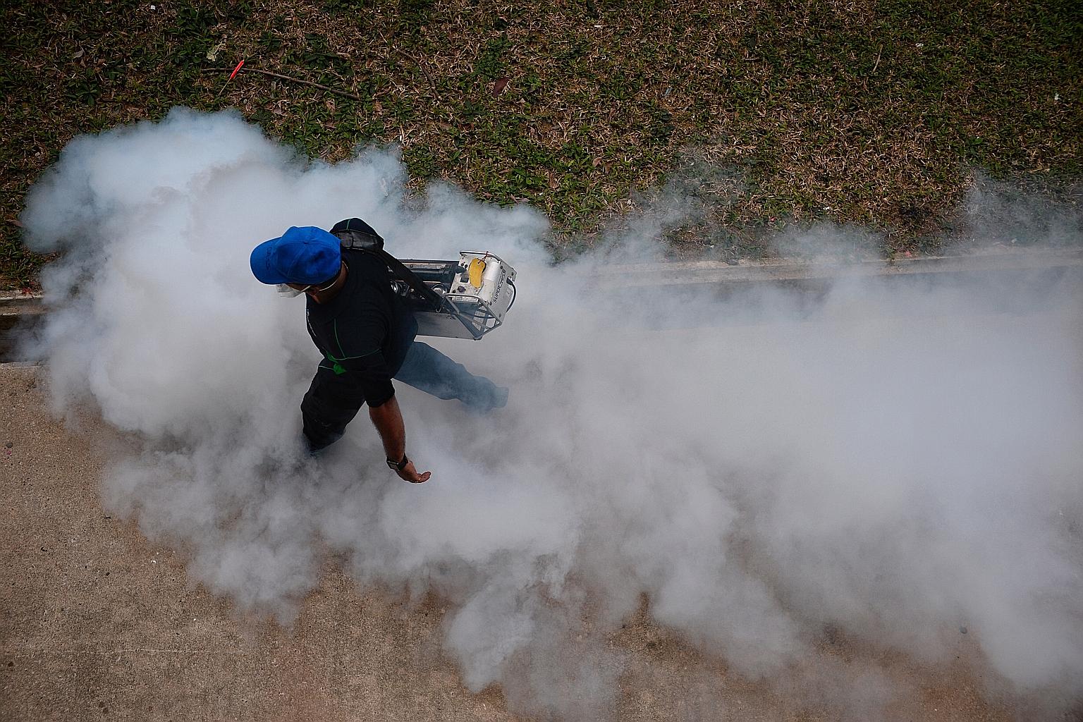Fogging near Block 409 in Bedok North Avenue 2 on Thursday. The Zika virus can cause microcephaly in babies whose mothers were infected during pregnancy. Four out of five infected people do not show any symptoms.