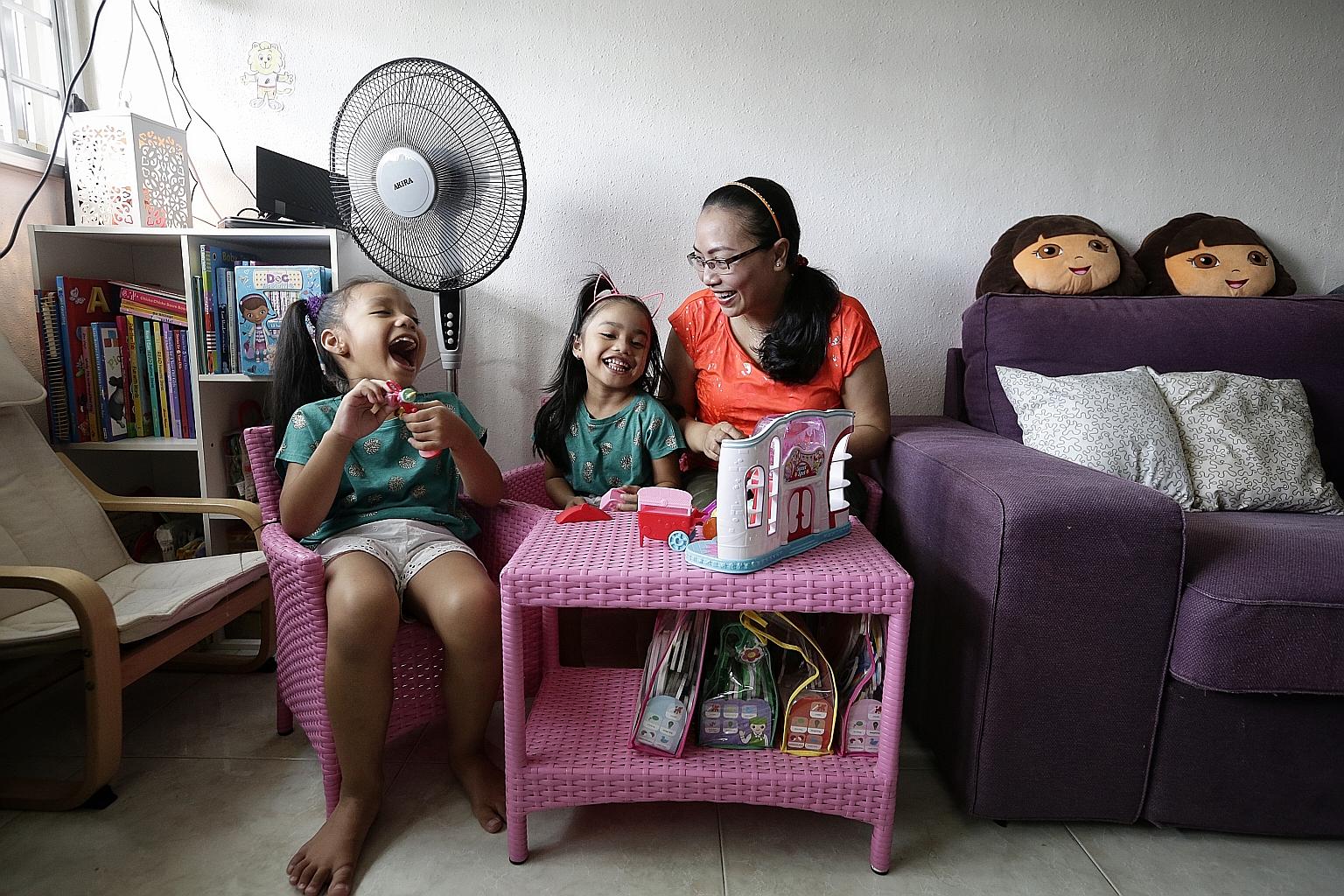Madam Siti Zubaidah, who lives in Tampines, says she will avoid taking outdoors her daughters Amelia Shasmeen Azman (left), six, and Alisha Mia Shafana Azman, four.