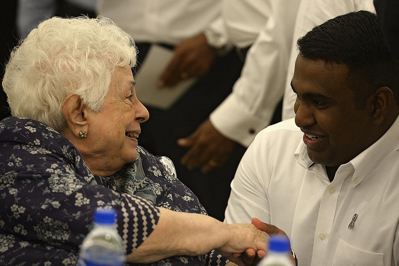 Mr Santhiran with Madam Urmila Nandey, wife of Mr Nathan, at the gathering of the Indian community in Singapore to remember the late former president yesterday.