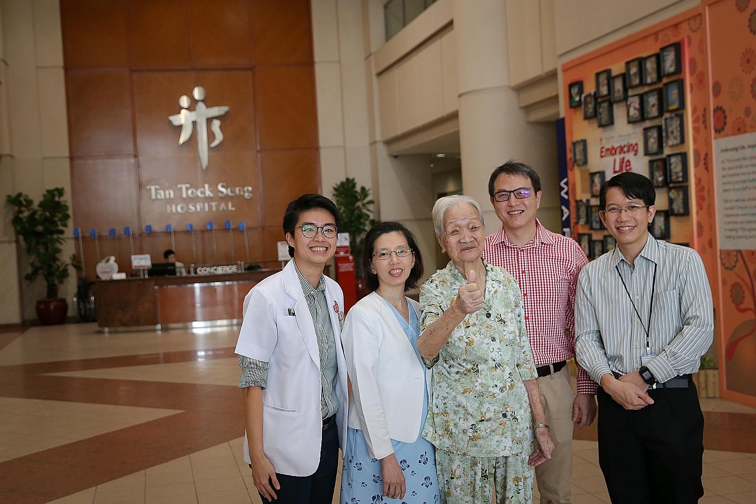 Madam Cheng, 95, with (from left) TTSH's senior dietitian Ong Yawei; nurse clinician Kitty Ho; Dr Jonathan Tan, senior consultant for the department of anaesthesiology and head of the surgical intensive care unit; and Dr Fong Sau Shung, consultant fo