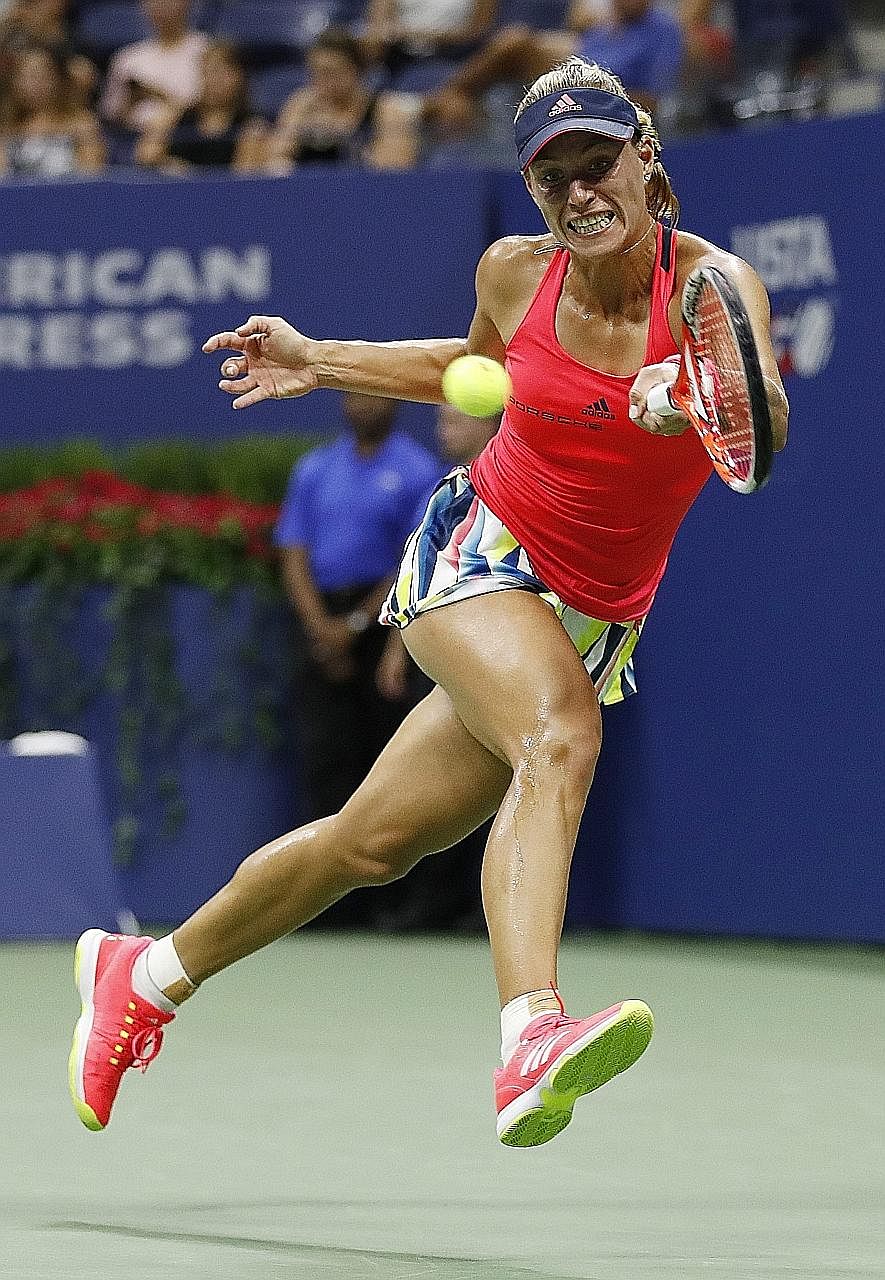 Angelique Kerber chasing down a forehand during her 6-4, 6-3 US Open semi-final win against Caroline Wozniacki on Thursday. Serena Williams' loss assured Kerber of the world No. 1 ranking.