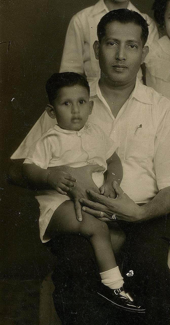 The writer with his father In a family picture taken in a photo studio. With no informal photographs from the 1950s, the writer has no way of knowing what his father was like when he was relaxed, in his home clothes. The writer's father with his best