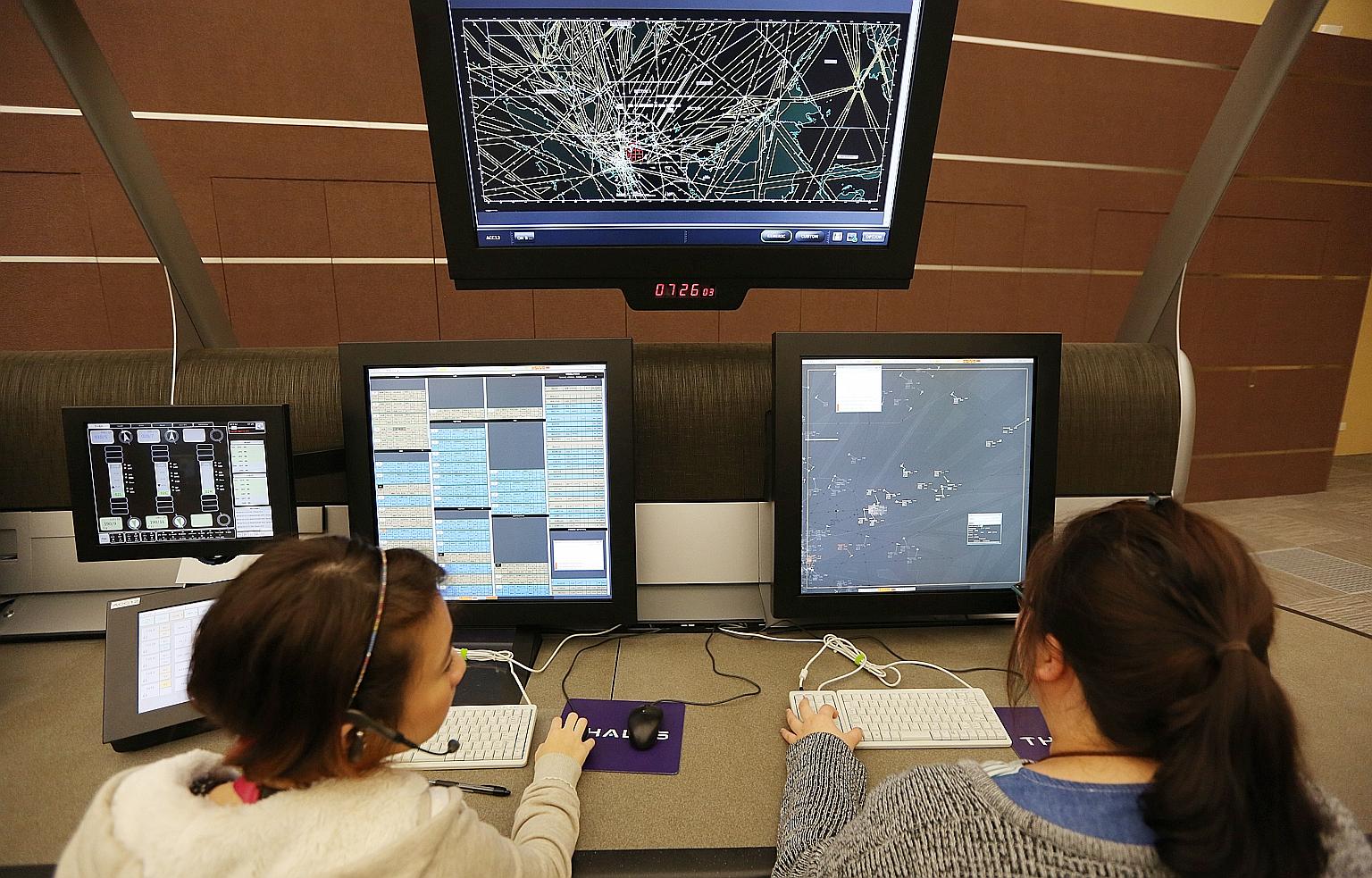 Air traffic controllers at the Singapore Air Traffic Control Centre. Apart from the recruitment drive, CAAS is reviewing processes and procedures, in line with a global ICAO initiative, to reduce fatigue among the staff.