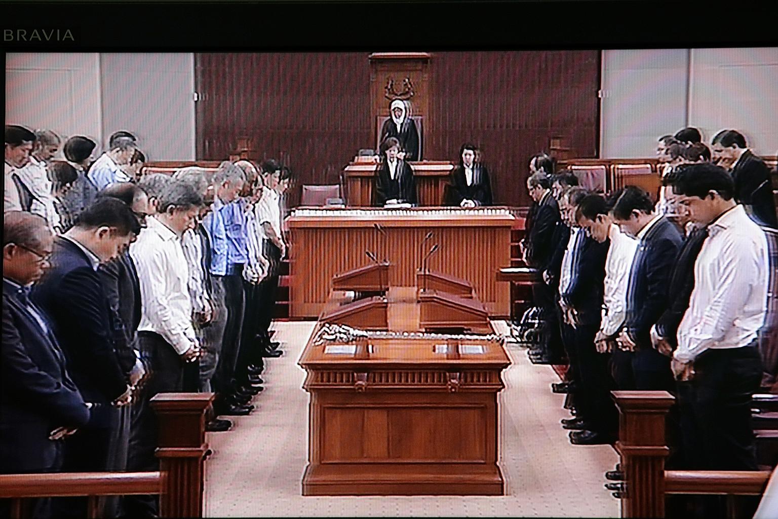 An image taken off television showing Parliament observing a minute of silence in honour of Mr Nathan who died on Aug 22. Nine members of the House rose to pay tribute to the former president. Also present were Mr Nathan's wife Urmila, children Juthi