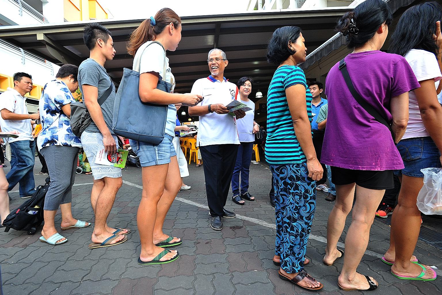 Mr Masagos (centre) making his rounds in Tampines earlier this month during outreach efforts on the Zika threat. In Parliament yesterday, the minister cited several factors contributing to Singapore's vulnerability to mosquito-borne infections, inclu