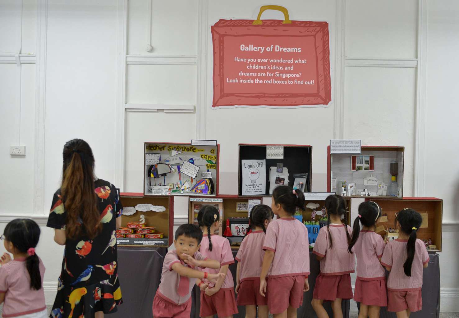 At St James' Church Kindergarten yesterday, some of its pupils' community projects and dreams for Singapore were presented as craft work displayed in red boxes at the kindergarten's campus in Newton