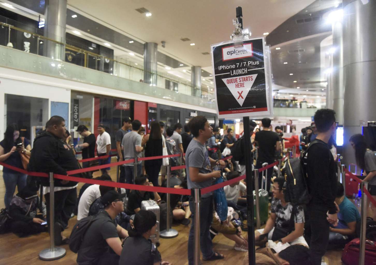 The queue for the Apple iPhone 7 and 7 Plus outside the EpiCentre store in Ion Orchard, before the doors opened at 9am yesterday.