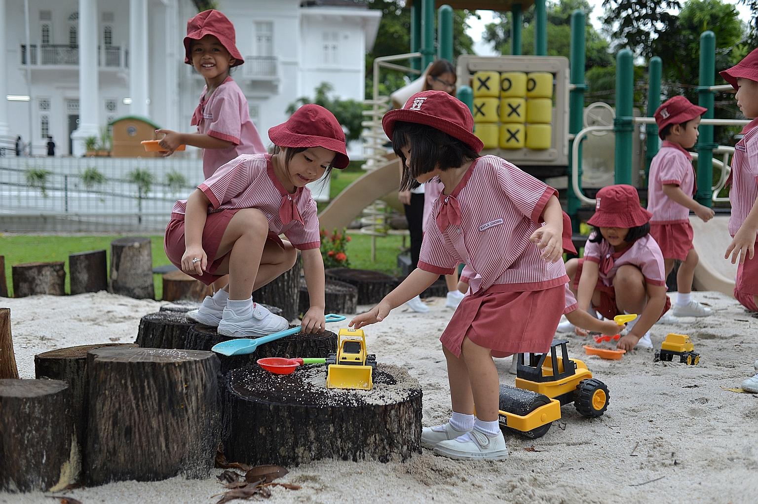 Children from a nursery class at St James' Church Kindergarten at play. The enrolment there bucks the declining trend. Even so, it is considering opening a childcare centre after multiple requests from parents.
