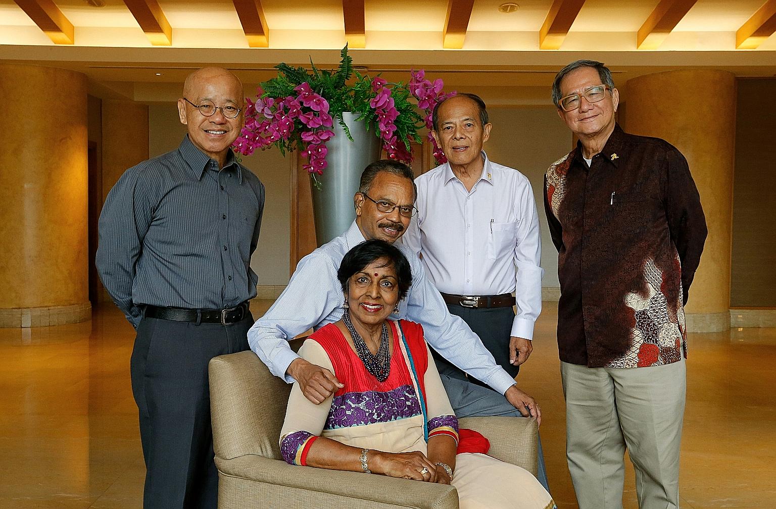 Wedding solemnisers at the appreciation event yesterday included (standing, from left) Dr William Wan Kok Tang, 69, Reverend Patrick Lau Kim Thiam, 67, and Reverend Alfred Ang Cheng Kiat, 71, and (seated) Mr Murugayah Suppiah and his wife Govindan Ir