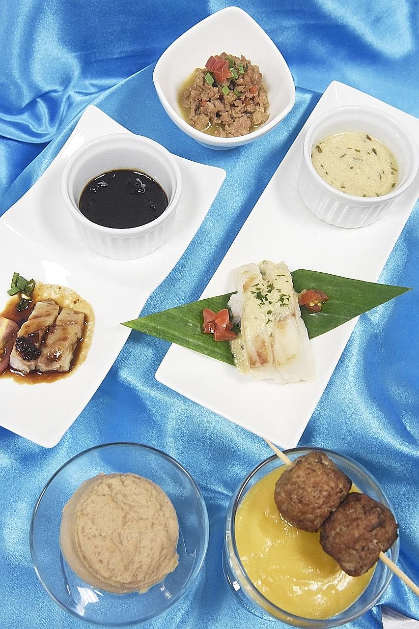 The dishes - developed by CGH and produced by Health Food Matters - include (from top) coarsely minced kicap fish, coarsely minced steamed fish with oriental sauce, blended braised ginseng chicken and coarsely minced chicken patties with orange chees