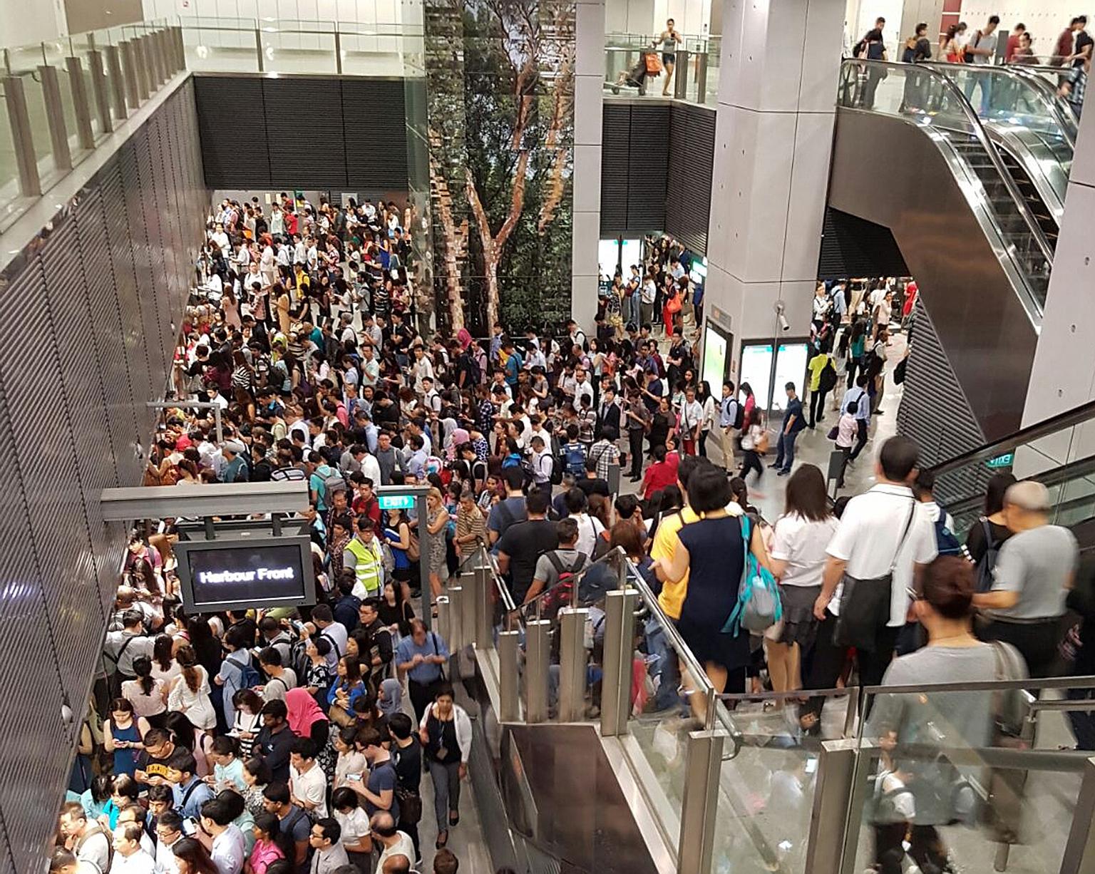 The crowd at Buona Vista MRT station early yesterday morning, during the single worst rail disruption in five months. SMRT said the fault was on the same track switch hit by a glitch on Sept 5.