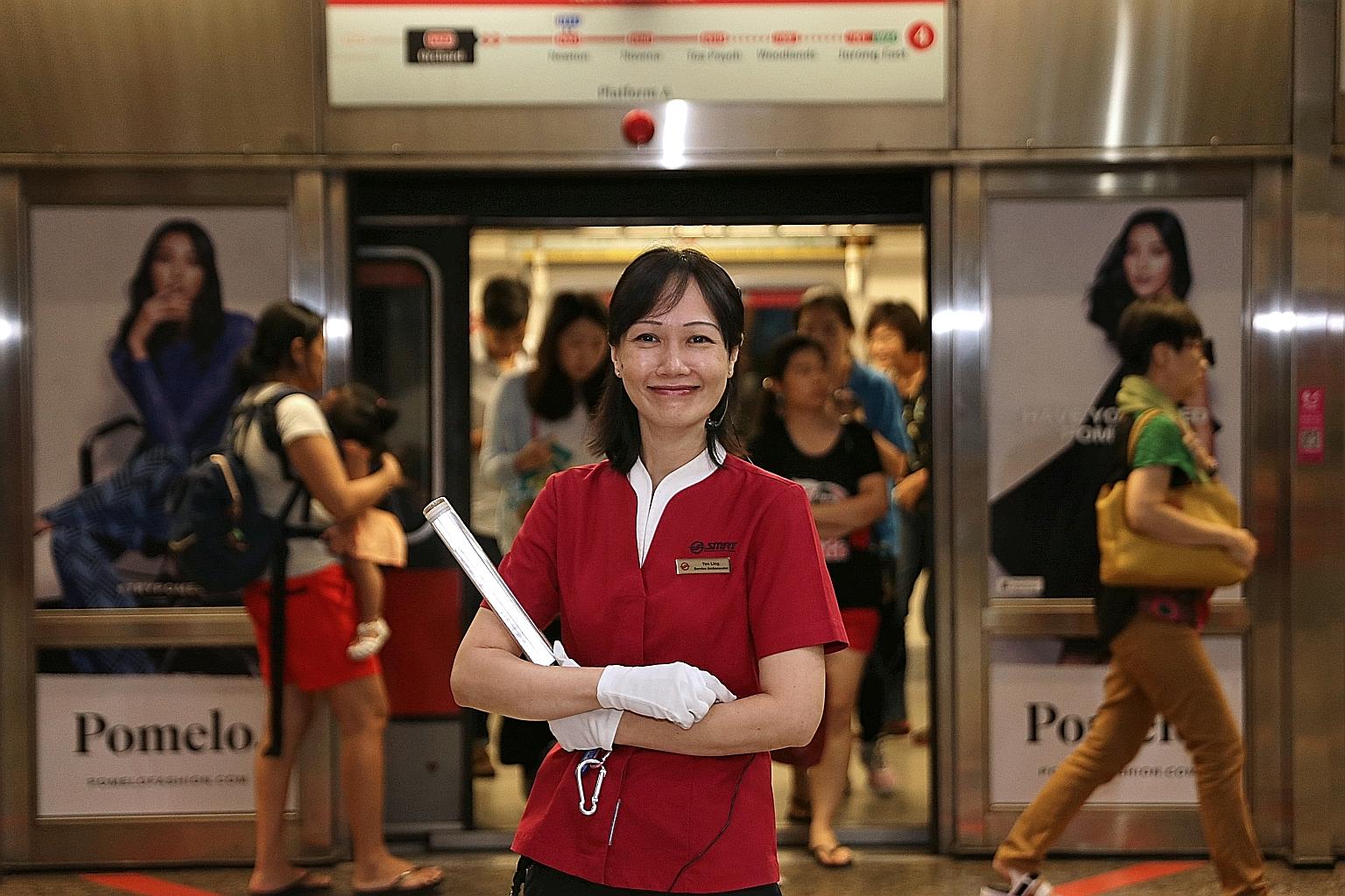 SMRT service ambassador Lim Yen Ling said training from the Forget Us Not initiative has enabled her to better identify and assist people with dementia in the midst of a chaotic peak-hour crowd.