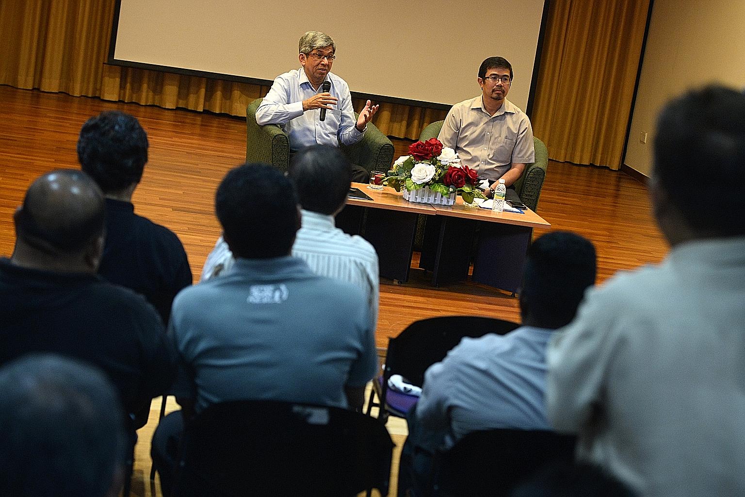 Dr Yaacob (left) and Mr Zainal at the dialogue with unionists at Mendaki's premises in Siglap yesterday. Dr Yaacob said it was important to ensure the presidency is held by people from all the major races from time to time as the president is a symbo