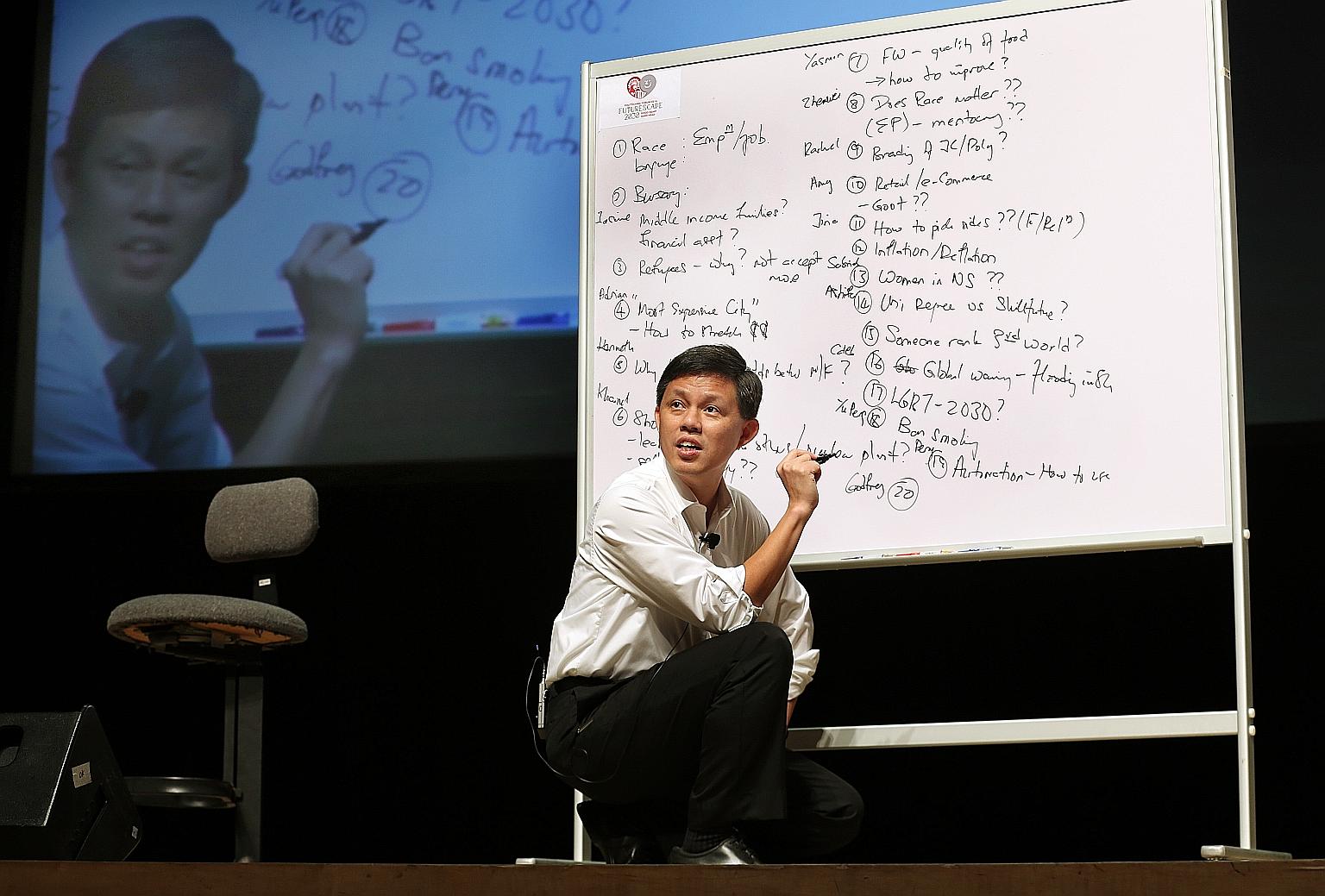 Mr Chan responding to questions put to him by polytechnic students at yesterday's dialogue.