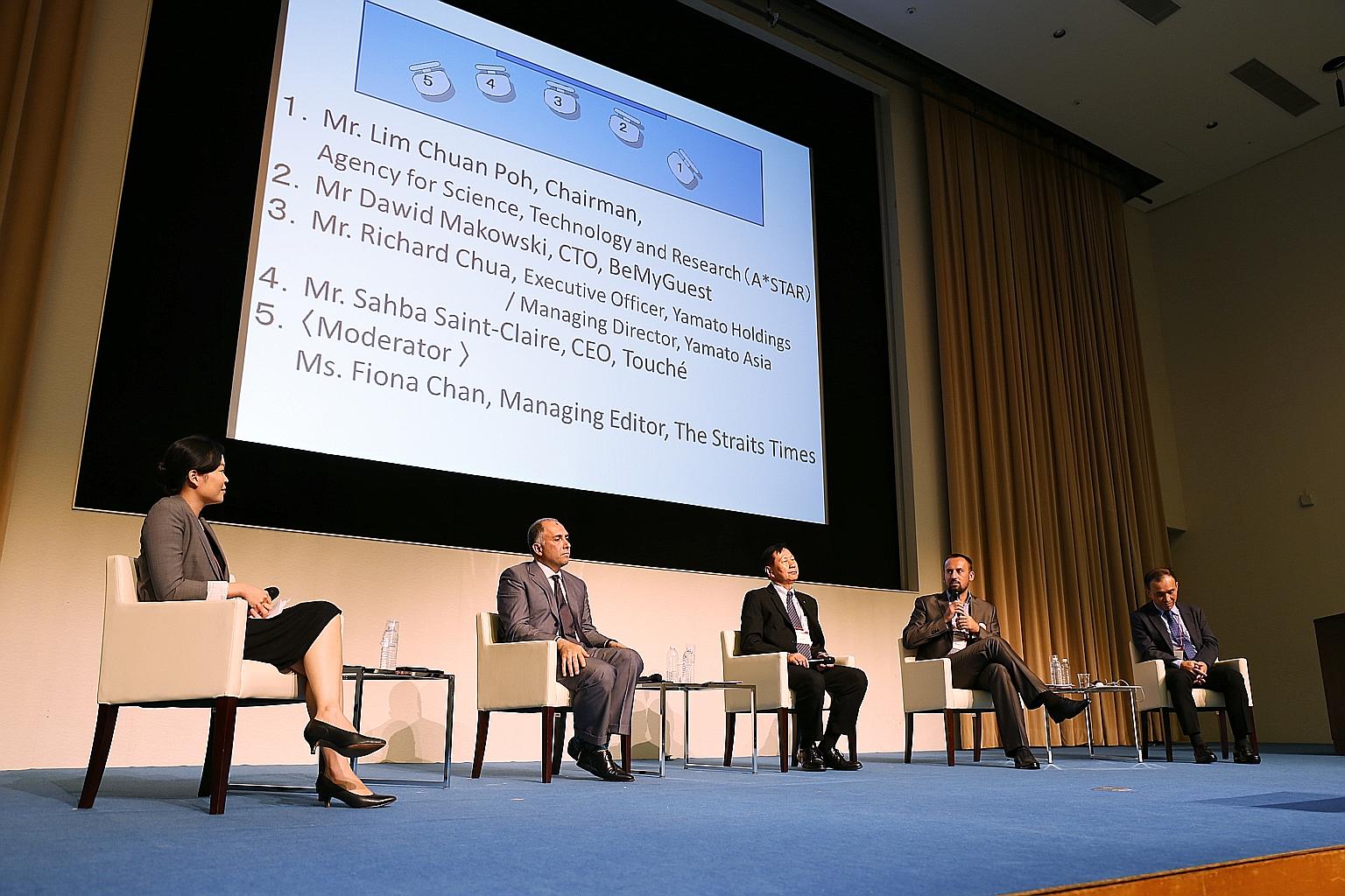 (From left) Straits Times managing editor Fiona Chan, Touche chief executive Sahba Saint-Claire, Yamato Holdings executive director Richard Chua, BeMyGuest chief technology officer Dawid Makowski and Agency for Science, Technology and Research chairm