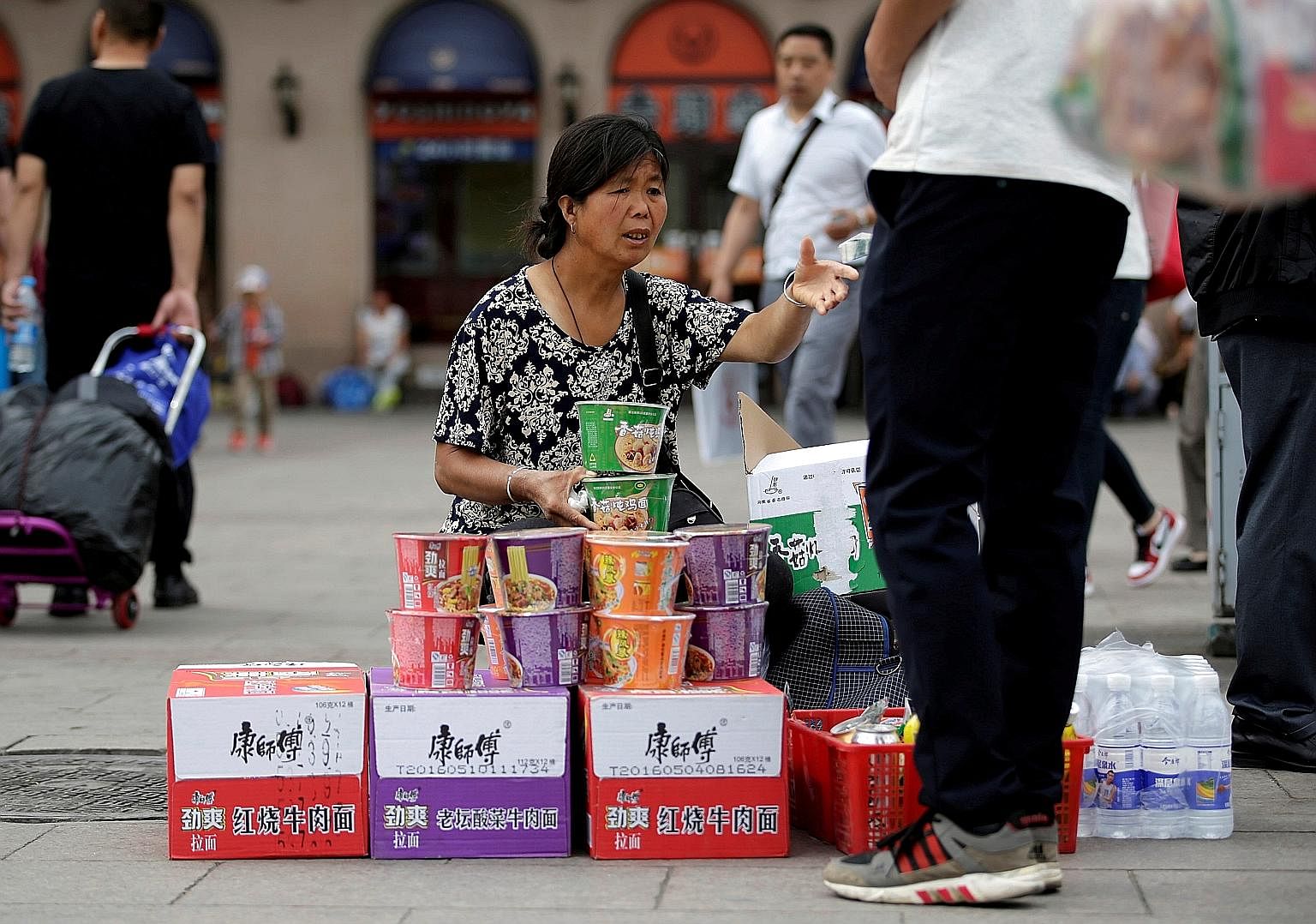 Instant noodles being sold at Beijing Railway Station in China. Just as China's economy has slowed, so too has its appetite for instant noodles.