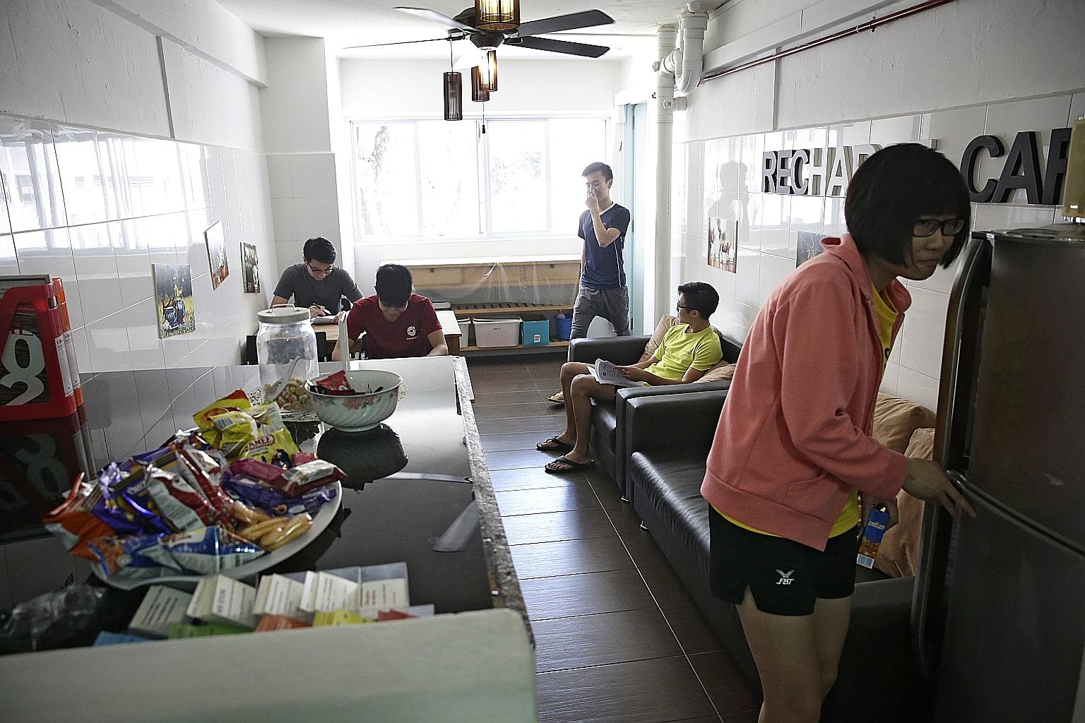 Students taking a break to revise or get a snack at the Recharge Cafe in Real Education Centre, Clementi, yesterday. In the face of rising competition, more tuition centres are offering free added services along with teaching.