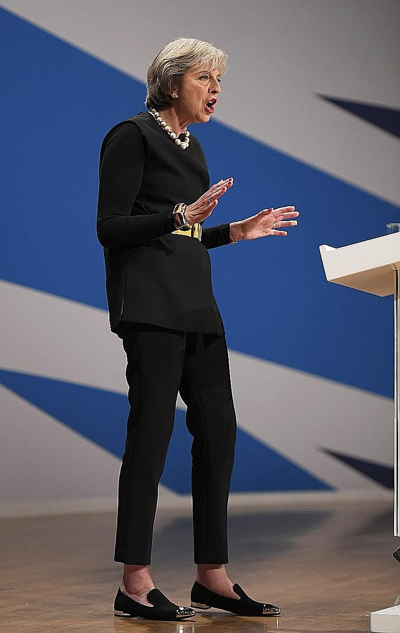 Mrs May speaking on Sunday at the Conservative Party conference, where she announced that Brexit talks will begin in March.